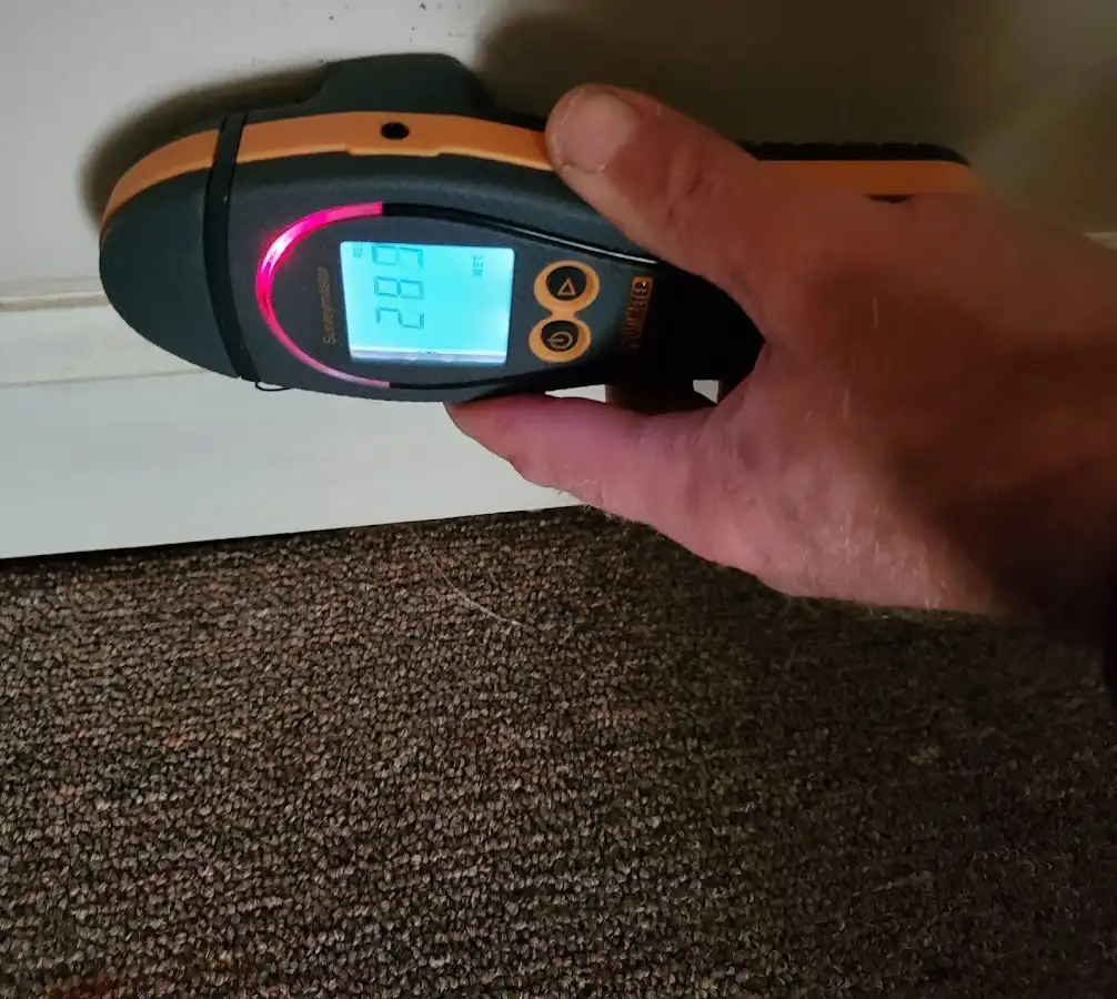 Moisture detection at baseboard during Burst Pipe Cleanup in New Berlin